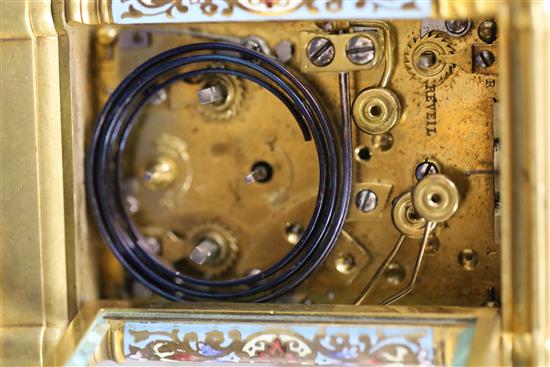 An early 20th century French ormolu and champleve enamel repeating carriage clock with alarm, 4.5in.